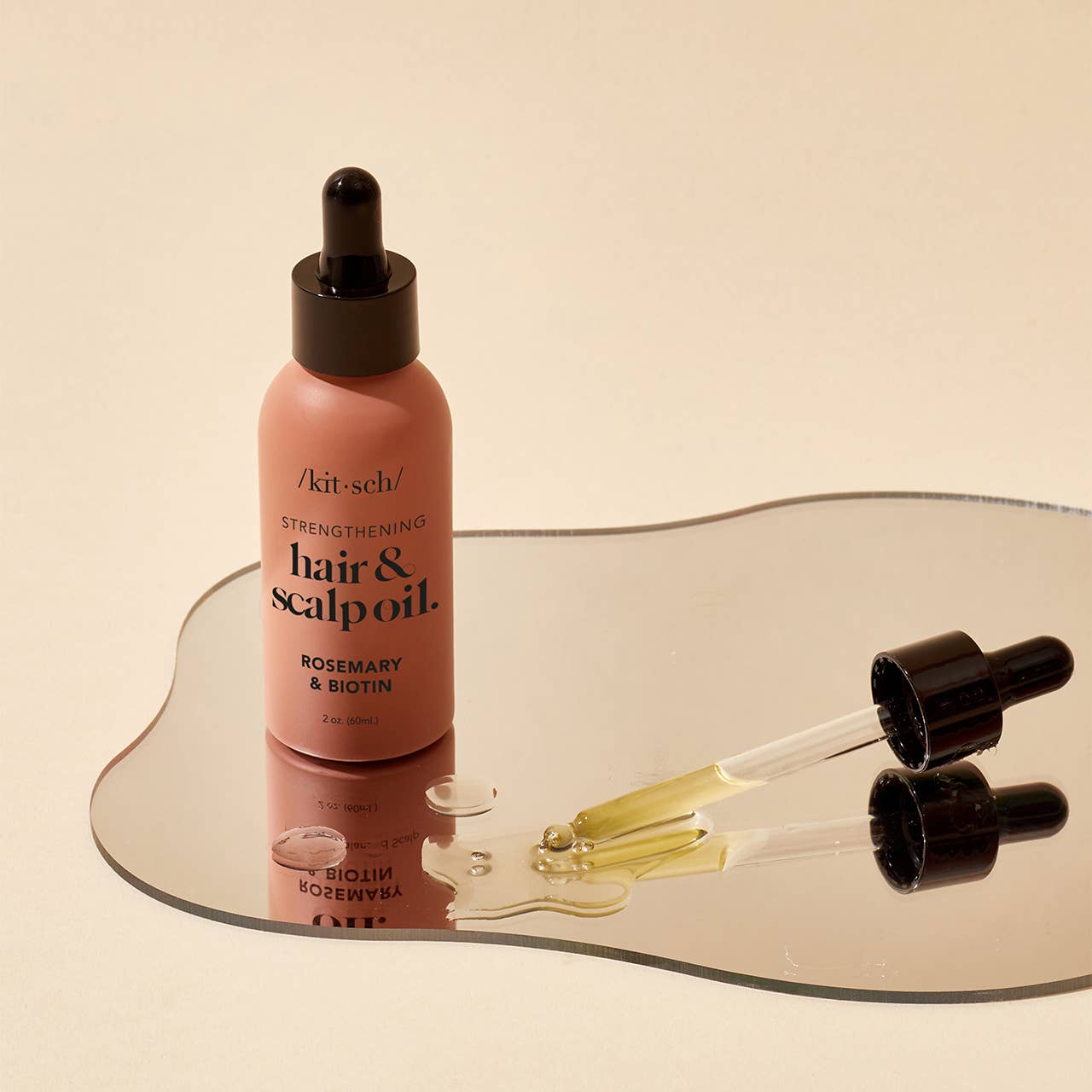 Kitsch Rosemary Scalp & Hair Oil: Strengthen hair with kitsch rosemary scalp & hair strengthening oil with biotin.